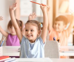 little girl with hands up