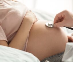 pregnant woman in the doctor